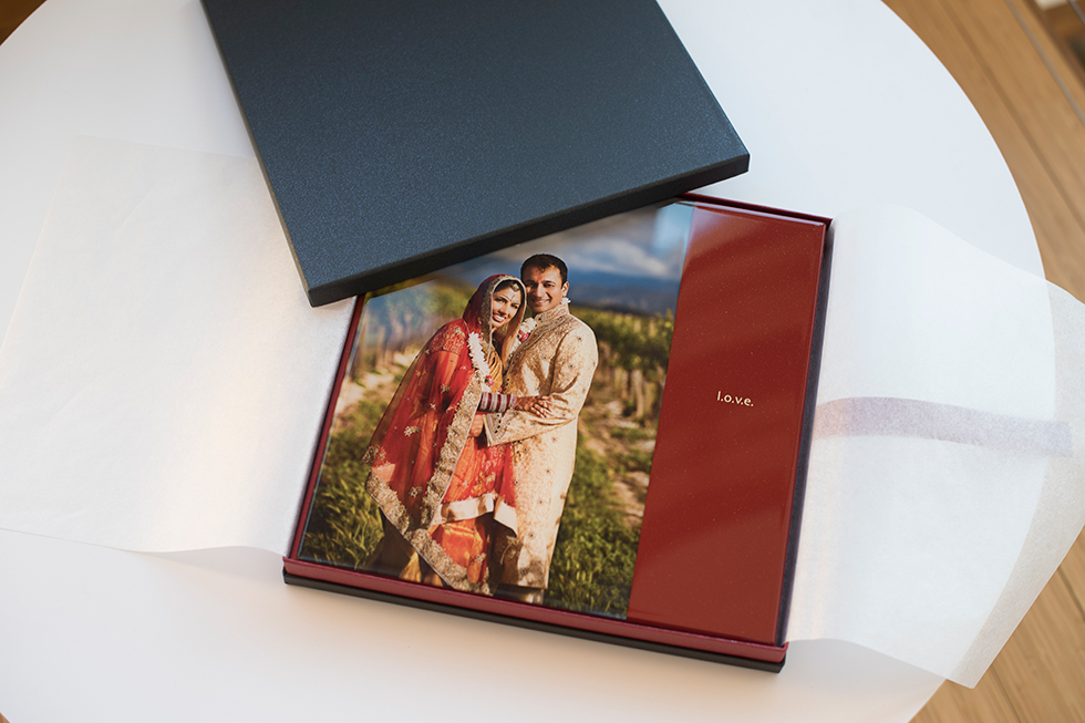 AsukaBook Cosmopolitan Photo Album with red cover shown inside the presentation box
