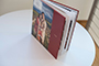 AsukaBook Cosmopolitan Photo Album with red cover showing the thin board pages
