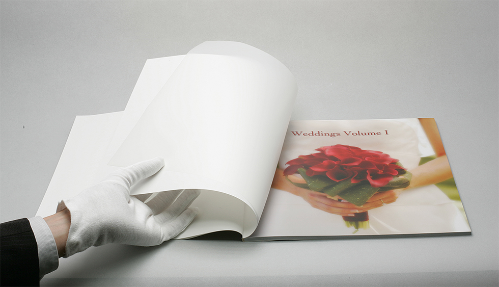 AsukaBook Book Bound Soft Cover Photo Book comes with a vellum sheet inside the cover