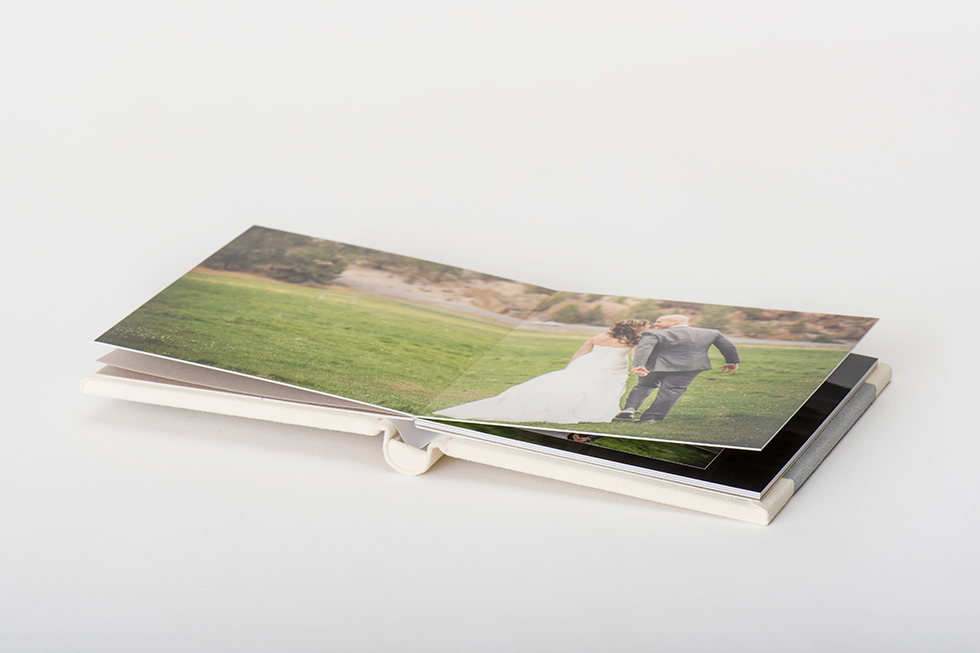 AsukaBook Heirloom Photo Album comes with medium weight board pages and a layflat binding