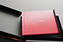 AsukaBook Zen Layflat Impact Photo Book Top view of retro red cover option inside the presentation box