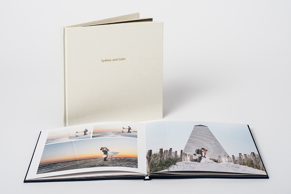 AsukaBook Zen Layflat Impact X Photo Book Cream linen-like cover with hot stamp text and layflat binding